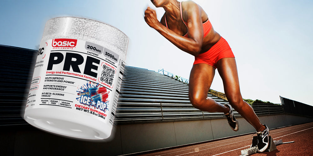 A container of Basic Supplements Ice Pop Pre-Workout is shown next to a sprinter launching off the starting blocks on an outdoor track, suggesting enhanced energy and performance.